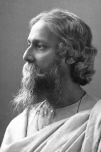 Rabindranath Thakur with beard long hair and white clothes